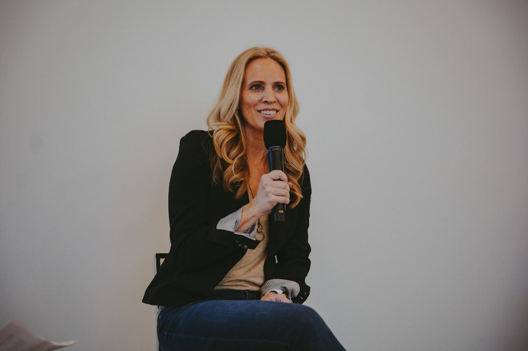 confident speaker on stage